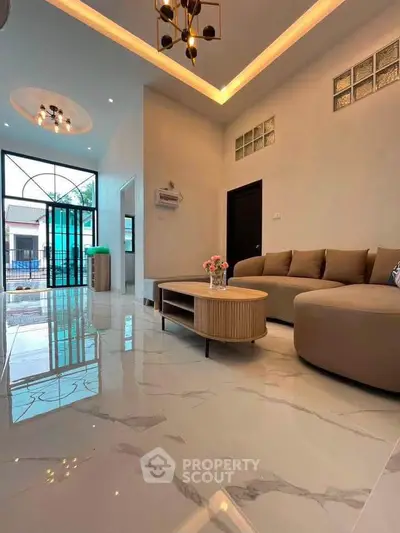 Modern living room with elegant furniture and glossy marble flooring, featuring stylish lighting and large windows.