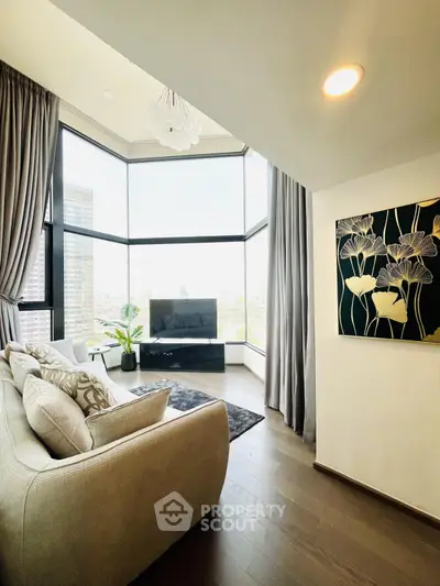 Luxurious corner living room with panoramic city views and elegant decor