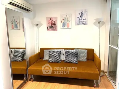 Stylish living room with modern sofa and decorative wall art