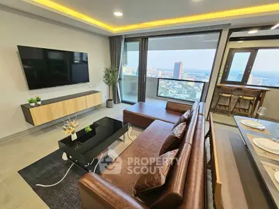 Luxurious modern living room with stunning city view and elegant furnishings.