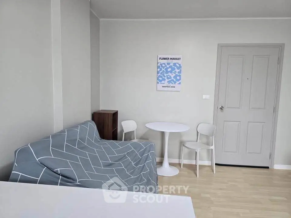 Modern minimalist living room with cozy sofa and stylish decor