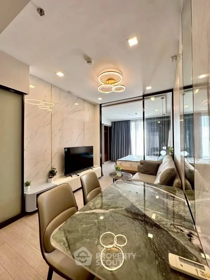 Luxurious modern living room with marble accents and elegant lighting