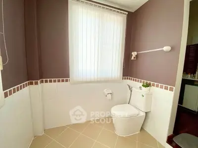 Spacious bathroom with modern fixtures and natural light