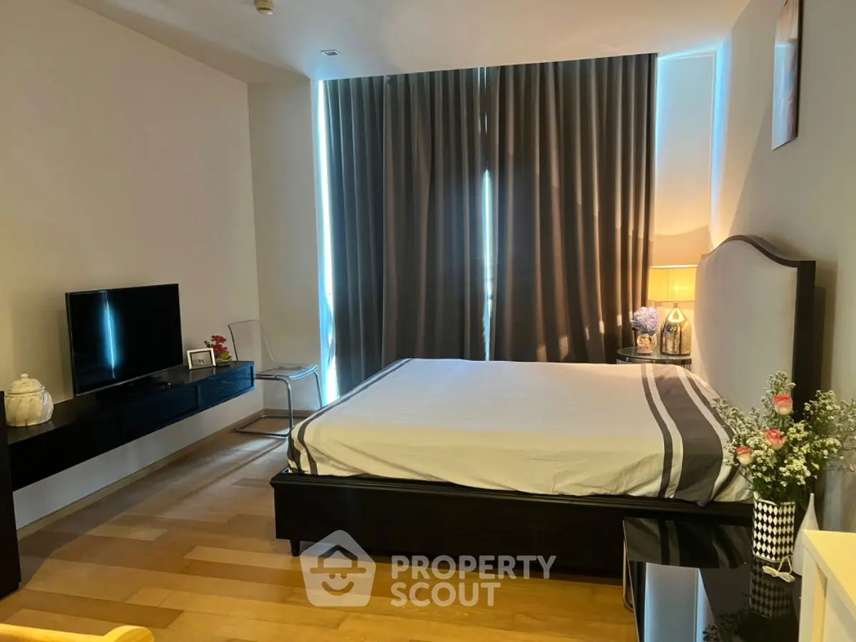 Modern bedroom with sleek furniture and ambient lighting