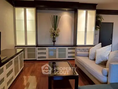 Elegant living room with modern cabinetry and stylish decor