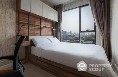 Modern bedroom with panoramic city view through large window, elegant wood accents, and cozy bedding, ideal for urban living.