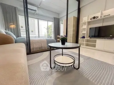 Modern studio apartment with stylish decor and natural light