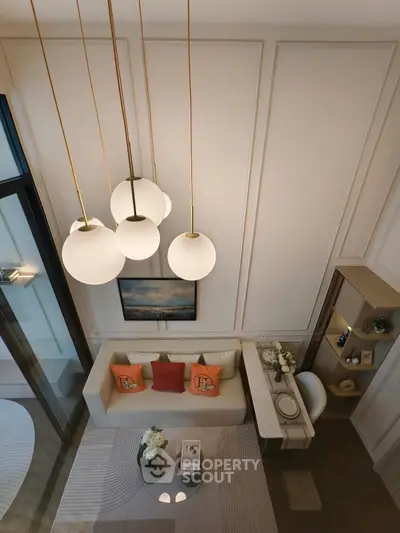 Elegant living room with modern lighting and stylish decor