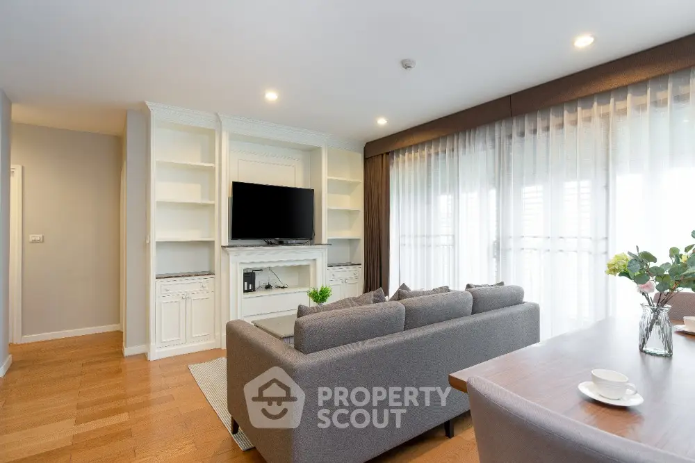 Spacious modern living room with elegant decor and natural light