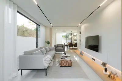 Modern living room with sleek design and natural light