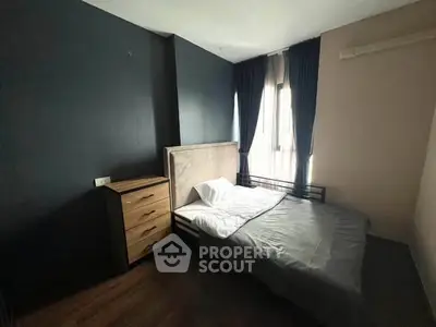 Cozy bedroom with modern decor and natural light