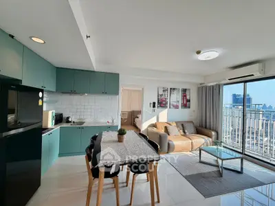 Modern open-layout living room with city view and stylish kitchen