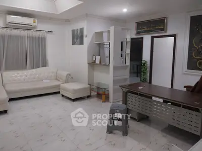 Spacious living room with modern furniture and elegant decor