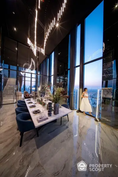 Luxurious high-rise dining area with panoramic city views and elegant decor