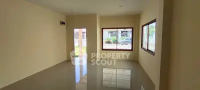 Spacious unfurnished room with large window and glossy floor, perfect for customization.