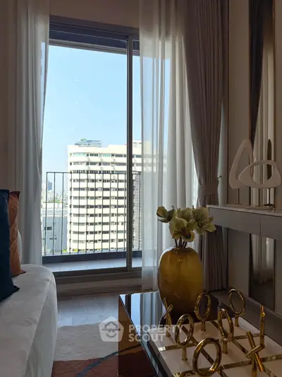 Stylish living room with modern decor and city view through large window