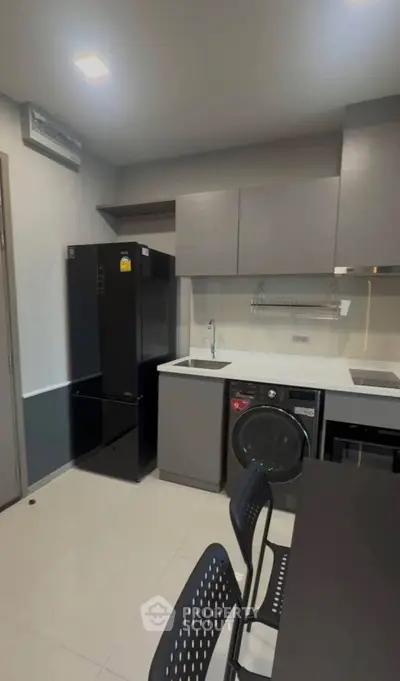 Modern kitchen with sleek appliances and minimalist design