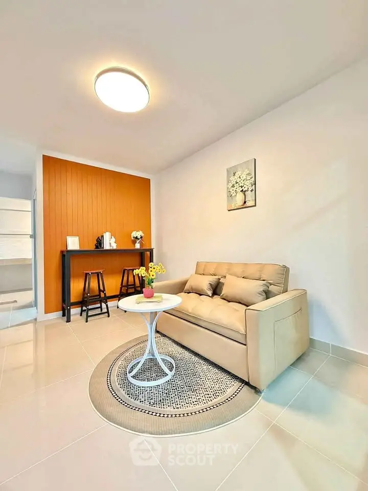 Modern living room with cozy sofa and stylish decor in a bright apartment