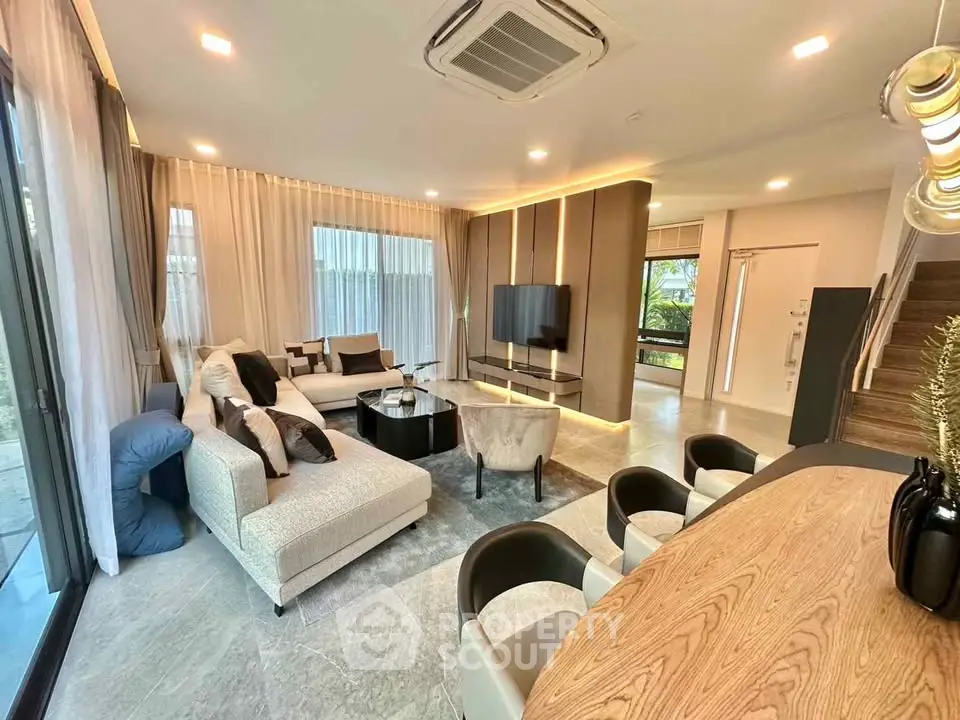 Luxurious modern living room with elegant decor and spacious seating area