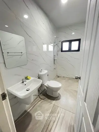 Modern bathroom with sleek fixtures and elegant tile design