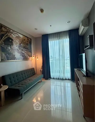 Modern living room with large window and stylish decor