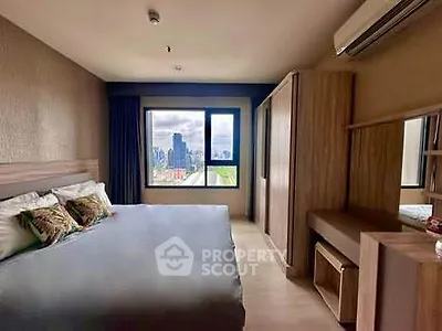 Spacious bedroom with city view in modern apartment