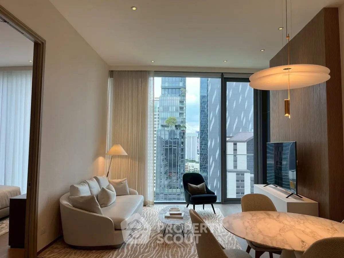 Luxurious modern living room with stunning city view and elegant furnishings.