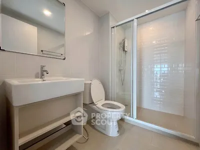 Modern bathroom with sleek shower and contemporary fixtures