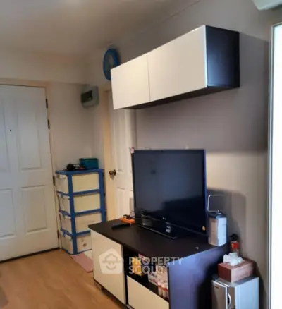 Cozy living room with modern TV stand and storage solutions