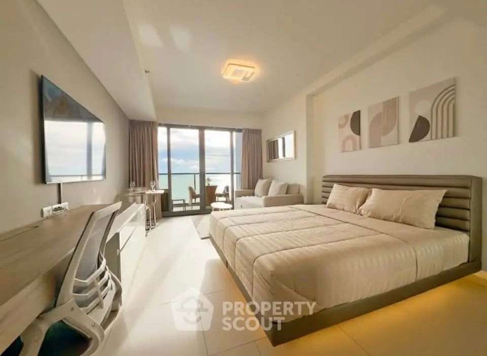 Luxurious bedroom with stunning sea view and modern decor