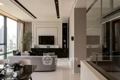 Luxurious modern living room with city view, elegant decor, and open layout.