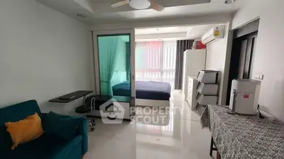 Modern studio apartment with sleek design and ample natural light