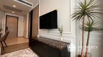 Modern living room with sleek TV setup and stylish decor