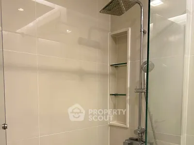 Modern bathroom with sleek shower and glass enclosure