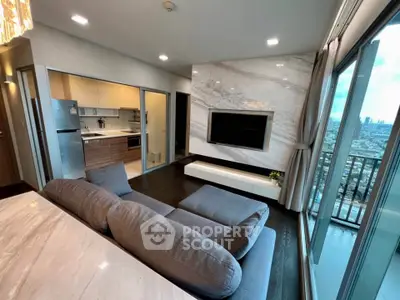 Modern living room with open kitchen and city view balcony in luxury apartment