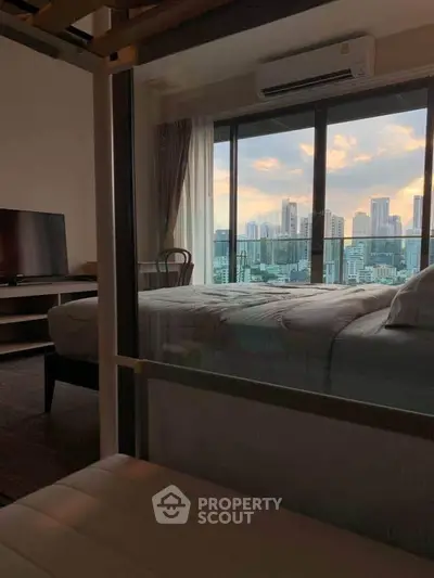 Luxurious bedroom with stunning city view and modern amenities