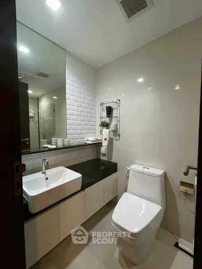 Modern bathroom with sleek fixtures and elegant tile design