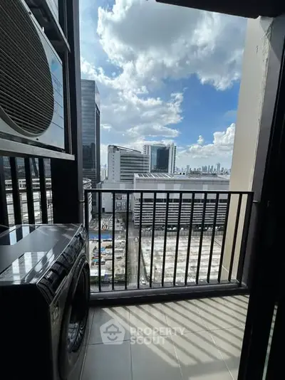 Modern balcony with city view and washing machine, perfect for urban living.