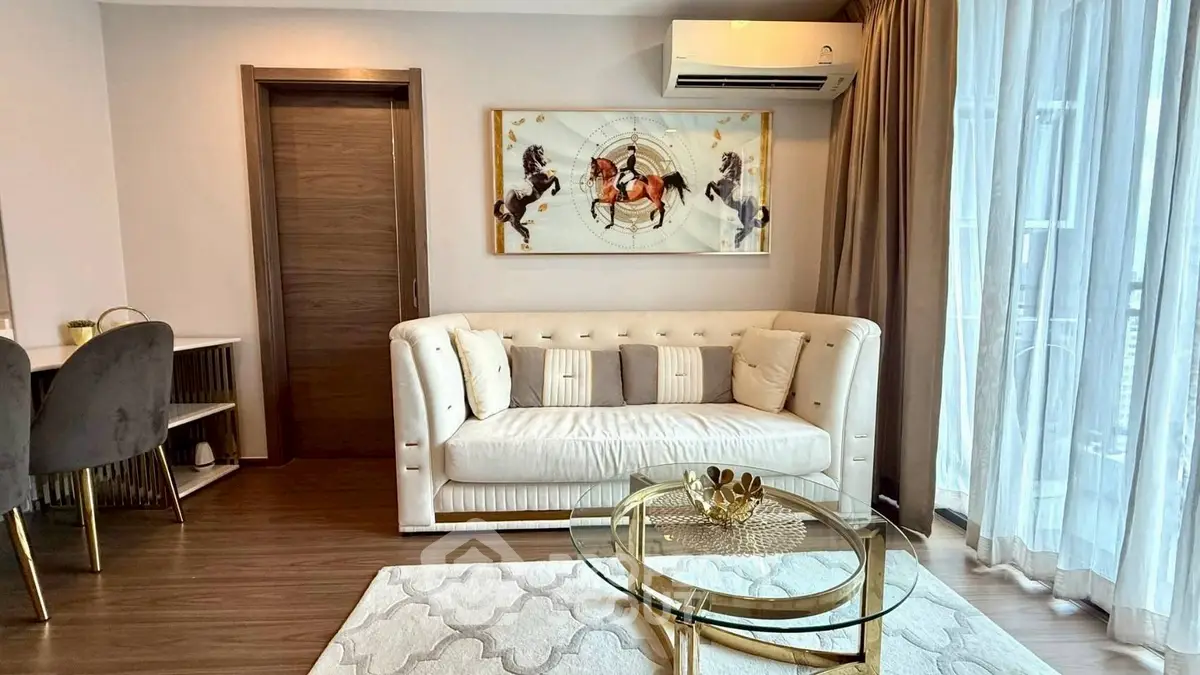 Luxurious living room with elegant decor and modern furniture in a stylish apartment.
