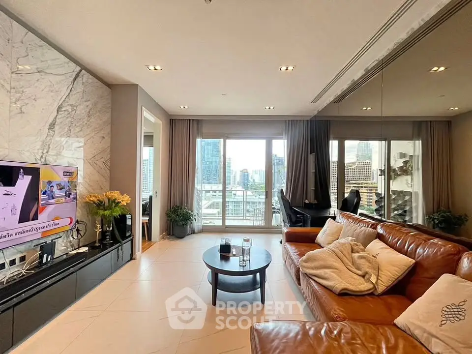 Luxurious living room with leather sofa and city view, perfect for urban living.