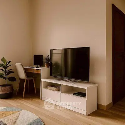 Modern living room with sleek TV stand and cozy workspace corner