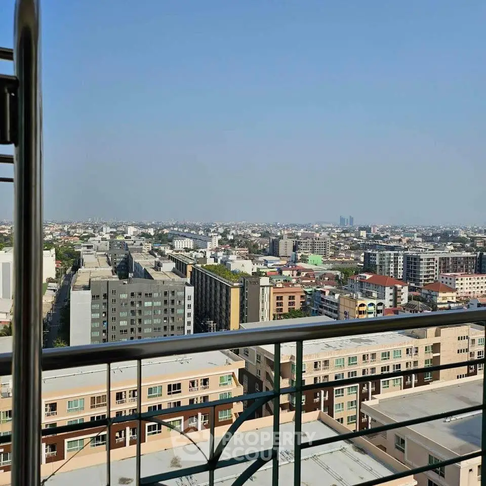 Stunning cityscape view from a high-rise balcony showcasing urban living at its finest.