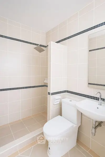 Modern bathroom with sleek shower and elegant fixtures