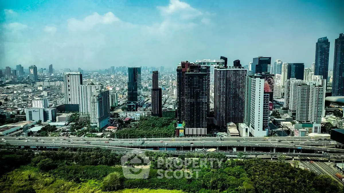Stunning cityscape view of modern skyscrapers and lush greenery, perfect for urban living enthusiasts.