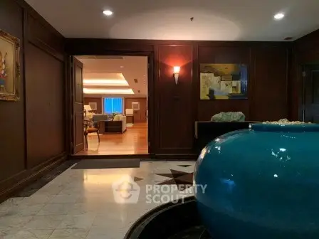 Luxurious lobby entrance with elegant decor and spacious living area view.