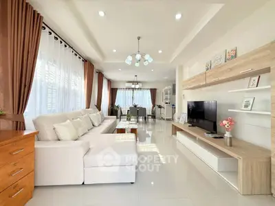 Spacious modern living room with elegant decor and natural light