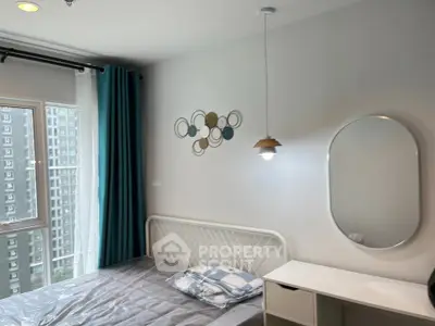 Modern bedroom with stylish decor and large window view