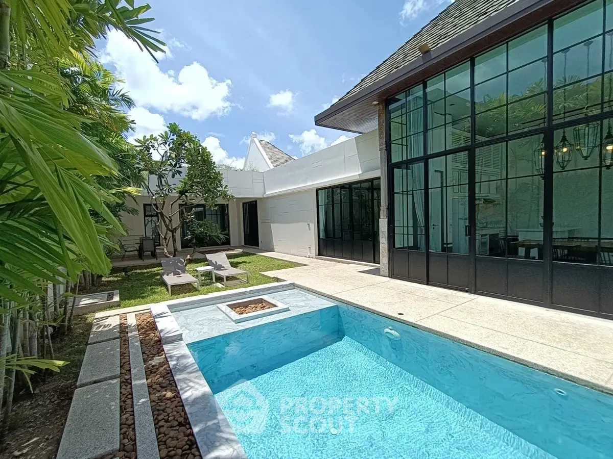 Luxurious villa with private pool and lush garden, perfect for relaxation and entertaining.
