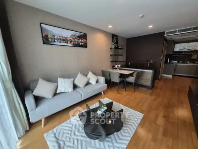 Modern living room with stylish decor and open kitchen layout