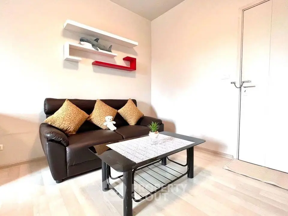 Cozy living room with modern decor and plush sofa
